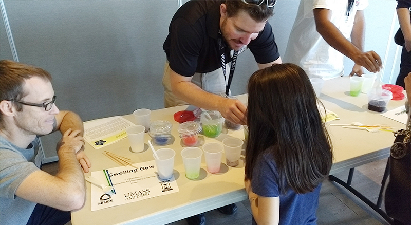 Keegan Karbach and other Metropolitan State University SPS members demonstrate why Rheology is cool (and gross!). Photos courtesy of Brad Conrad. 