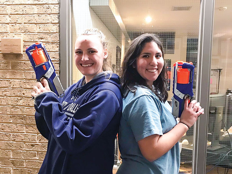  Two UD students prepare for battle. Photo by Gianna Milton.